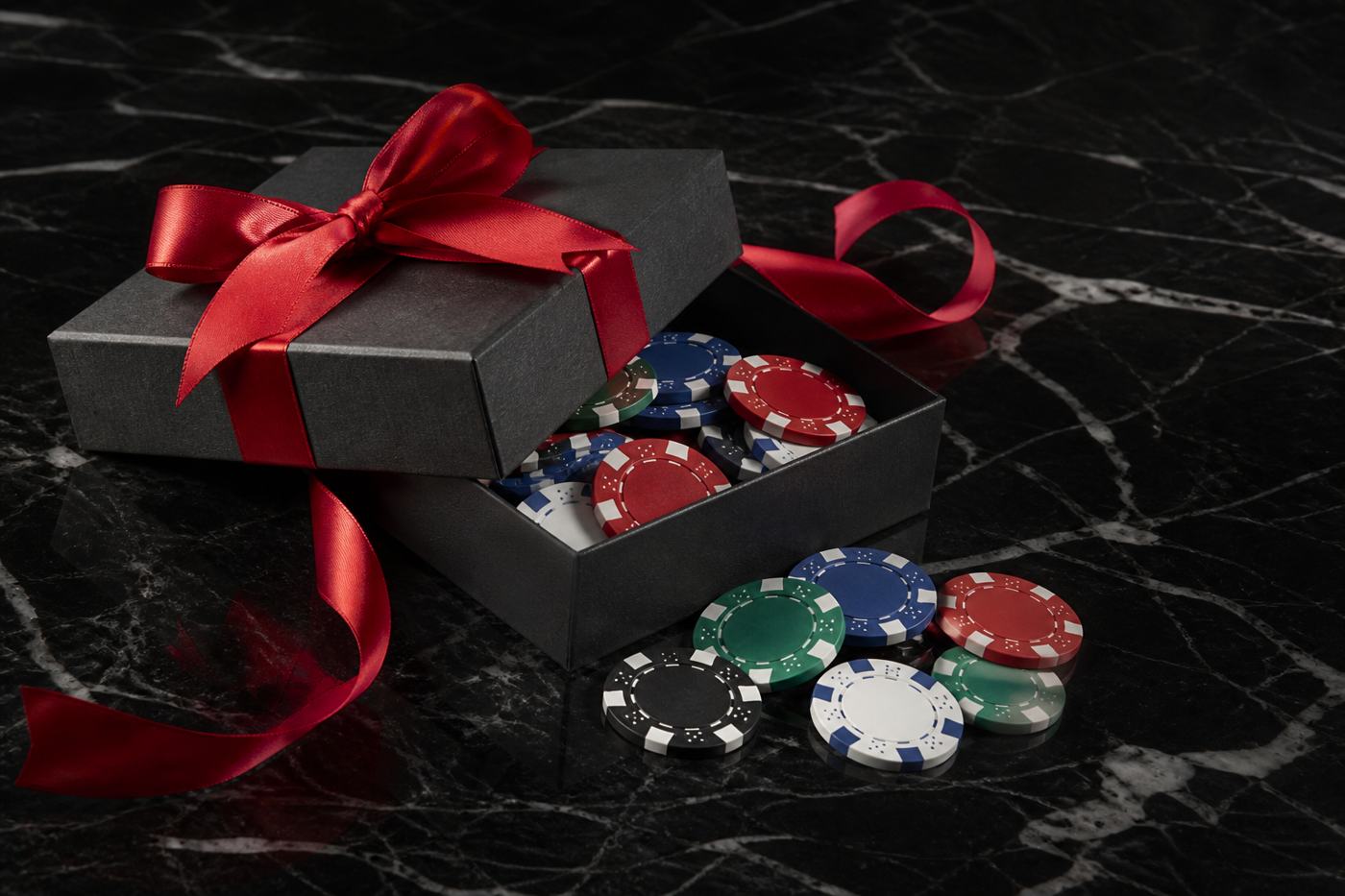 Gift box spilling chips, N1Bet casino welcome